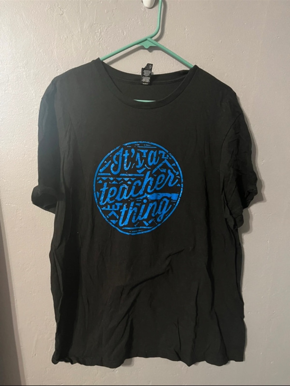 Black T-Shirt with Blue "It's a Teacher Thing" Graphic